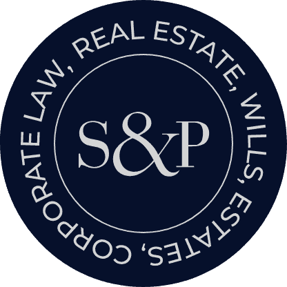 Logo of Strike and Phillips law firm in a circular design.