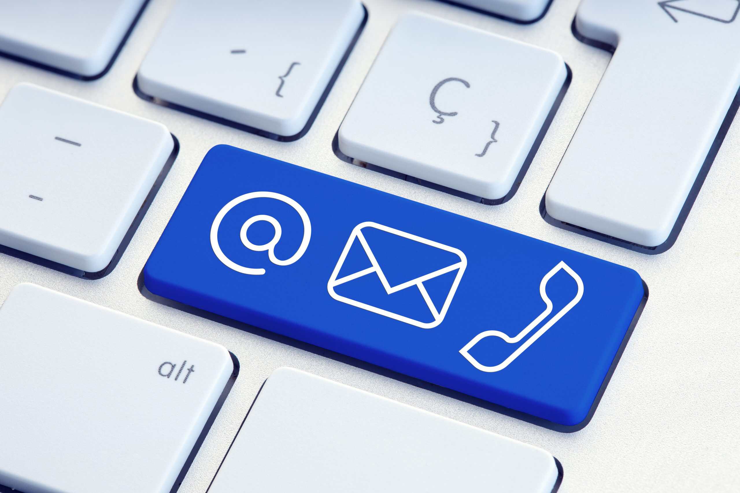Contact email, phone, and inquiry button on keyboard.